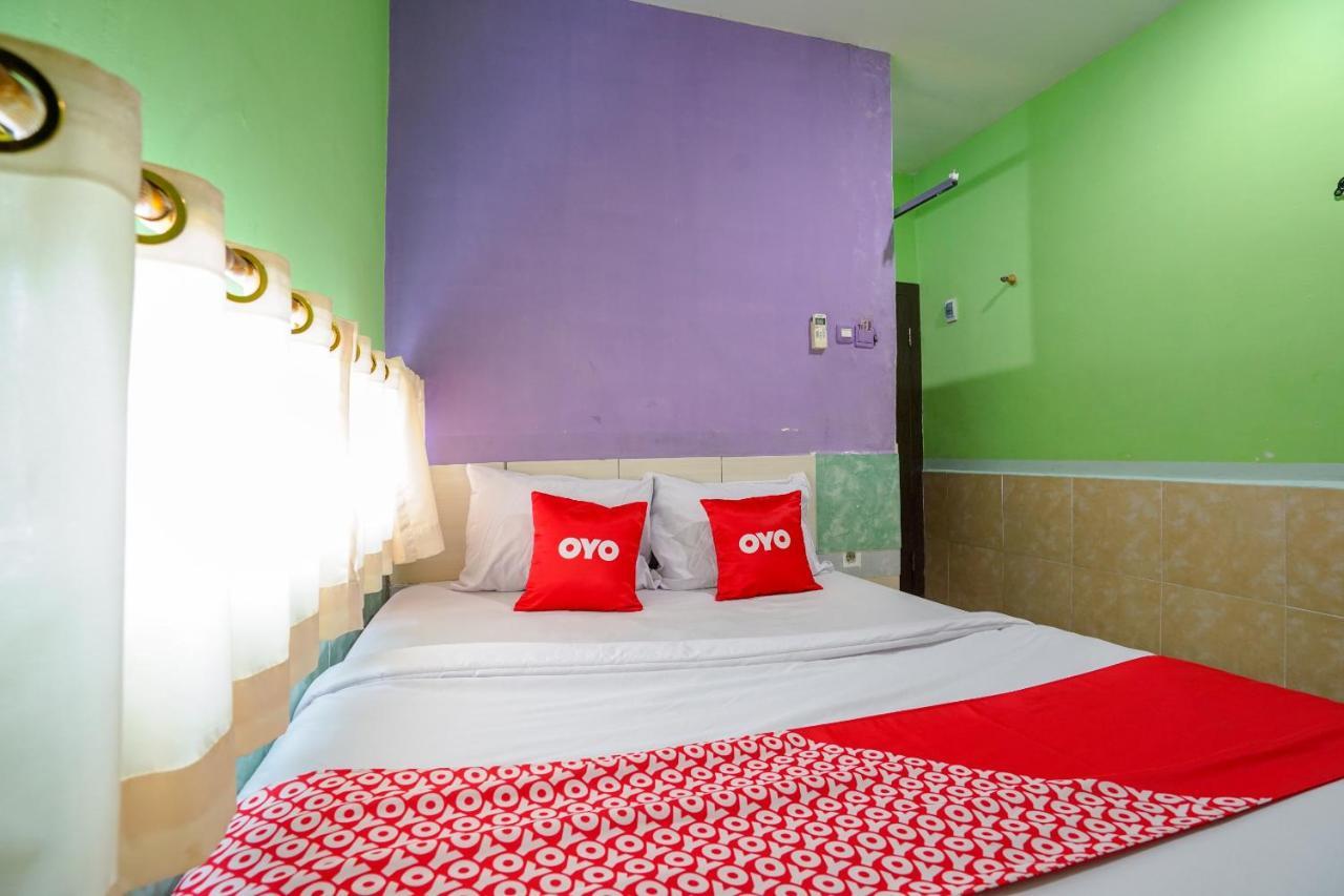 Oyo 1495 Hotel Lendosis Palembang Extérieur photo