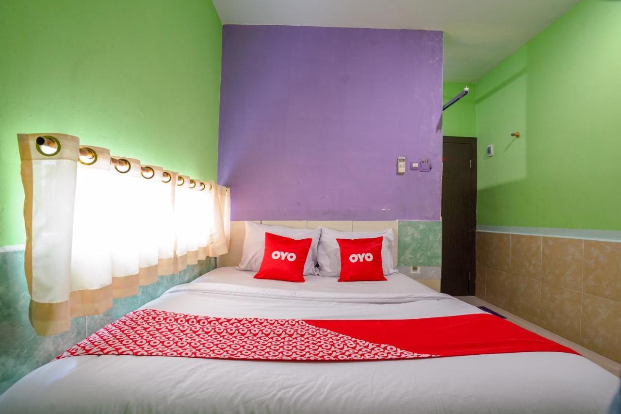 Oyo 1495 Hotel Lendosis Palembang Extérieur photo